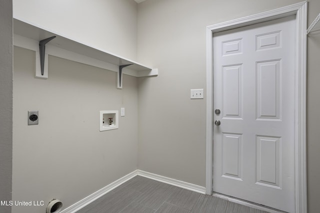 laundry area featuring hookup for a washing machine, baseboards, and electric dryer hookup