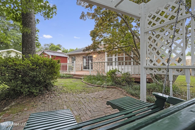 view of patio / terrace featuring a deck