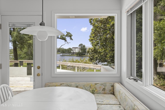 11 Bayou Pl, Gulfport, MS 39503 - dining space featuring a water view and healthy amount of natural light