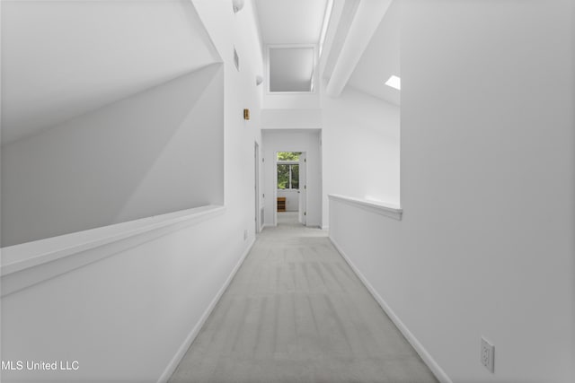 11 Bayou Pl, Gulfport, MS 39503 - corridor featuring carpet floors, lofted ceiling, baseboards, and a skylight