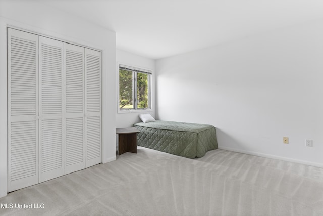 11 Bayou Pl, Gulfport, MS 39503 - carpeted bedroom with a closet and baseboards