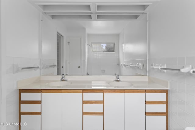 11 Bayou Pl, Gulfport, MS 39503 - full bathroom featuring tile walls and double vanity