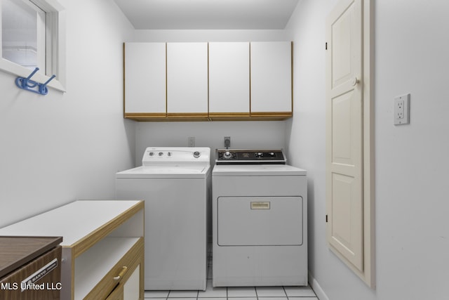 11 Bayou Pl, Gulfport, MS 39503 - laundry room with cabinet space, washing machine and clothes dryer, and light tile patterned floors