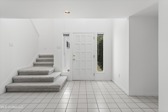 11 Bayou Pl, Gulfport, MS 39503 - foyer featuring stairs, light tile patterned floors, baseboards, and recessed lighting