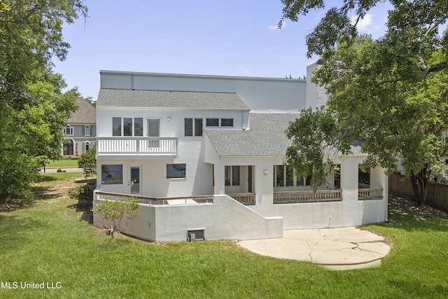 11 Bayou Pl, Gulfport, MS 39503 - rear view of property featuring a shingled roof, a balcony, and stucco siding
