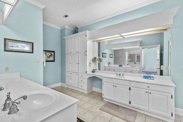 bathroom with tile patterned floors, vanity, and ornamental molding