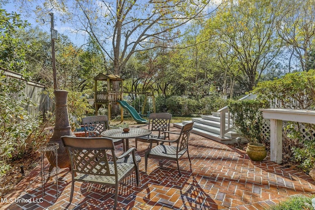 view of patio featuring a playground