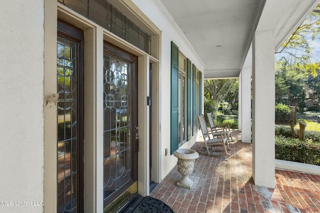 entrance to property with a porch