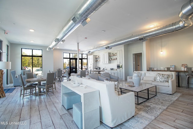 living area featuring light wood-style flooring