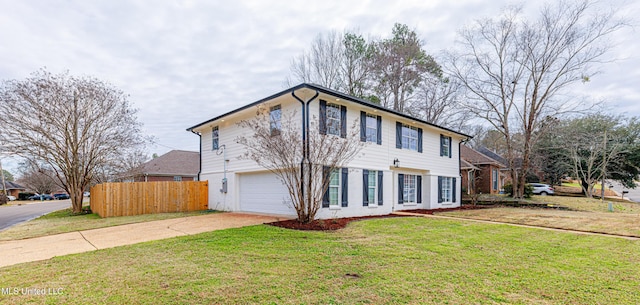 view of front facade featuring a garage and a front lawn