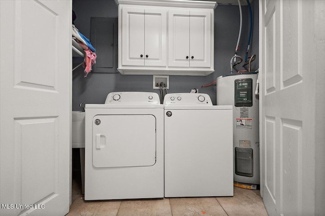 105 Rankin Rd, Brandon, MS 39042 - washroom with washer and clothes dryer, water heater, cabinet space, and light tile patterned floors