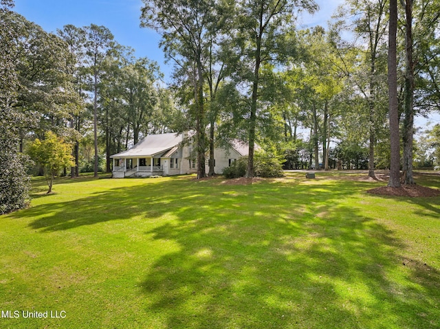 view of yard featuring a porch