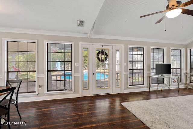 foyer featuring crown molding, vaulted ceiling, dark hardwood / wood-style floors, and ceiling fan