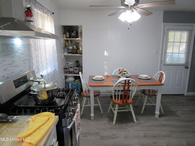 dining room with ceiling fan and wood-type flooring