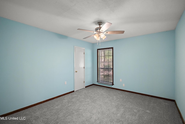 406 Springwood Cir, Terry, MS 39170 - carpeted empty room with a ceiling fan and baseboards