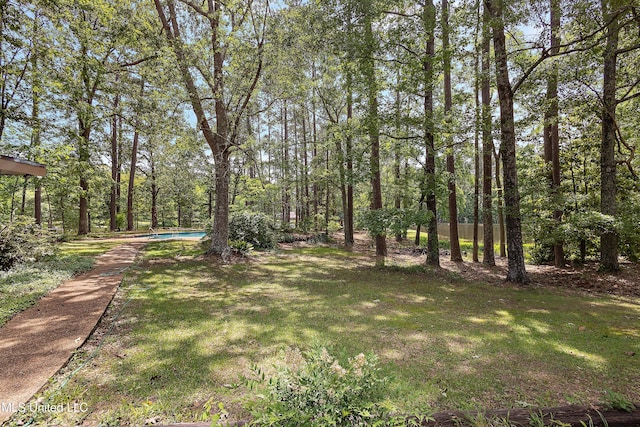 406 Springwood Cir, Terry, MS 39170 - view of grassy yard featuring an outdoor pool