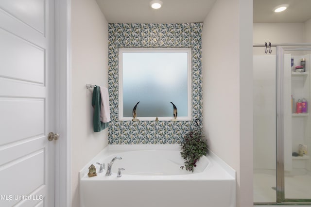 154 Magnolia Farms Dr, Lucedale, MS 39452 - bathroom featuring a bath, a shower stall, and wallpapered walls