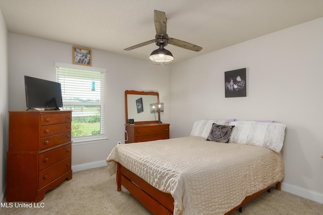 154 Magnolia Farms Dr, Lucedale, MS 39452 - bedroom with baseboards, light colored carpet, and ceiling fan