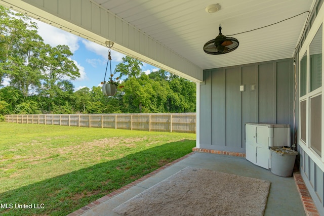 154 Magnolia Farms Dr, Lucedale, MS 39452 - view of yard with ceiling fan, a patio, and view of wooded area