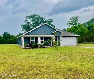 154 Magnolia Farms Dr, Lucedale, MS 39452 - view of front of home with a front yard, a garage, and driveway