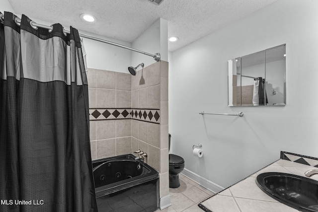 full bathroom featuring shower / tub combo, tile patterned flooring, toilet, vanity, and a textured ceiling