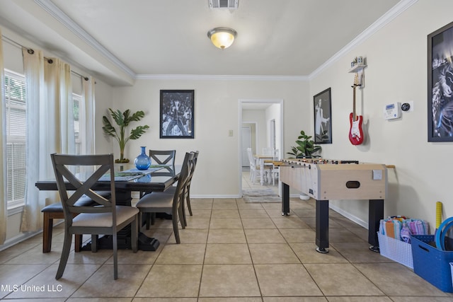 tiled dining space with ornamental molding