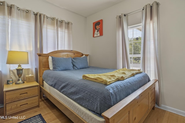 bedroom featuring light wood-type flooring