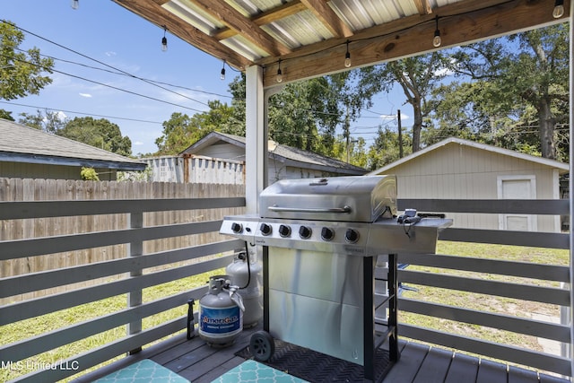 wooden terrace with grilling area