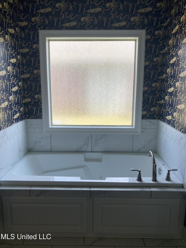 174 Falls Xing, Madison, MS 39110 - bathroom with wallpapered walls and a bath