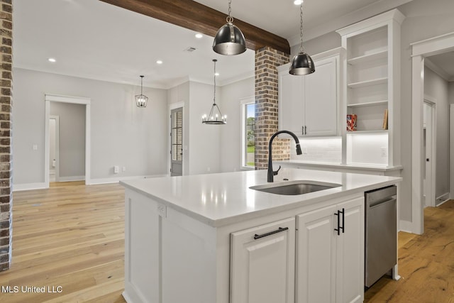 302 Wind Cv, Madison, MS 39110 - kitchen with a sink, open shelves, white cabinetry, a kitchen island with sink, and light wood-style flooring