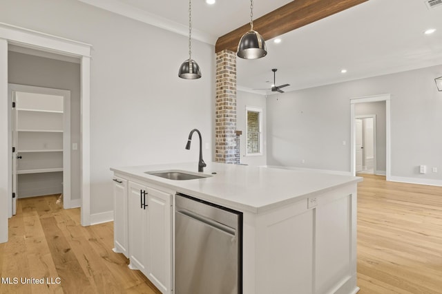 302 Wind Cv, Madison, MS 39110 - kitchen with dishwasher, a sink, ceiling fan, a center island with sink, and white cabinets