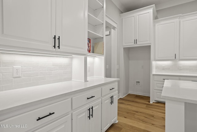 302 Wind Cv, Madison, MS 39110 - kitchen featuring open shelves, decorative backsplash, white cabinetry, and light wood-type flooring