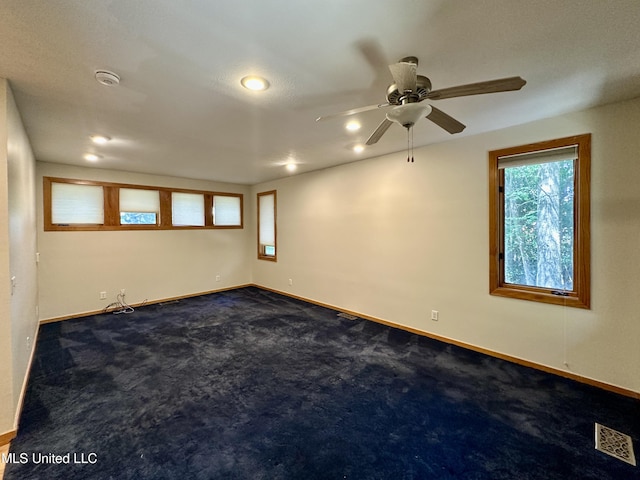211 Monterey Dr, Clinton, MS 39056 - unfurnished room featuring baseboards, ceiling fan, recessed lighting, and dark colored carpet