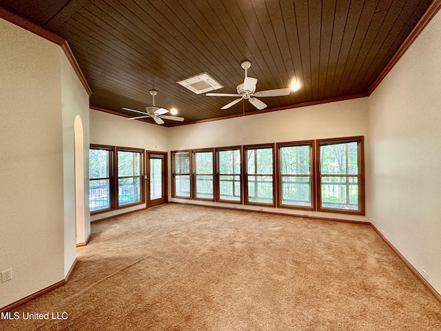 211 Monterey Dr, Clinton, MS 39056 - carpeted spare room featuring wooden ceiling, ceiling fan, crown molding, baseboards, and arched walkways