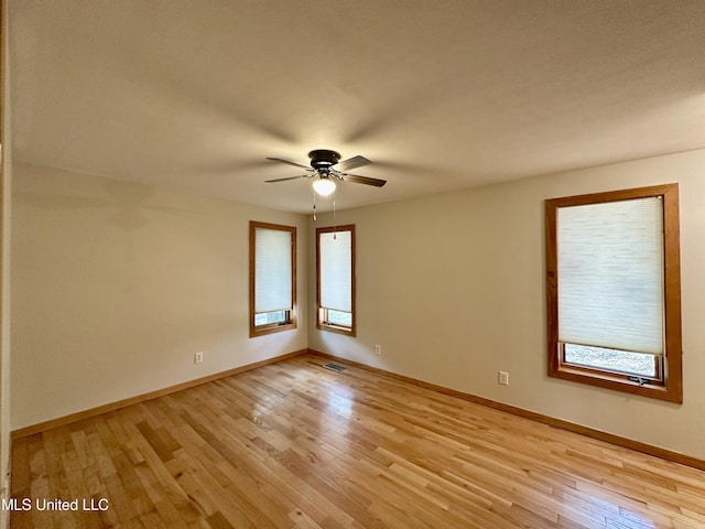 211 Monterey Dr, Clinton, MS 39056 - unfurnished room featuring ceiling fan, light wood finished floors, and baseboards