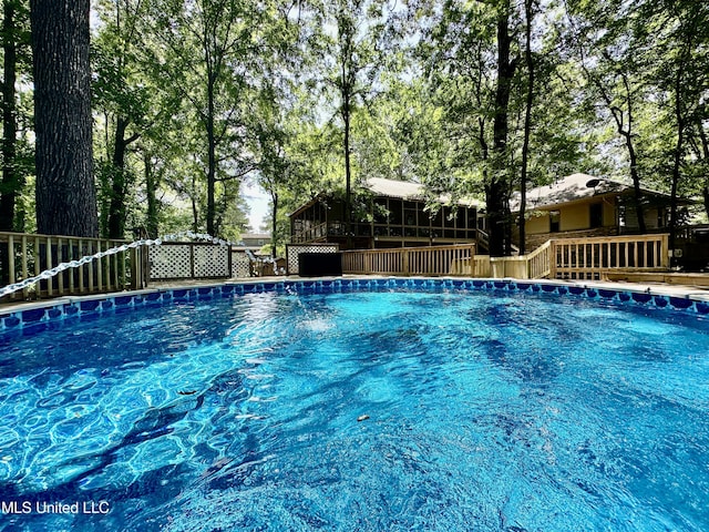 211 Monterey Dr, Clinton, MS 39056 - swimming pool with a wooden deck