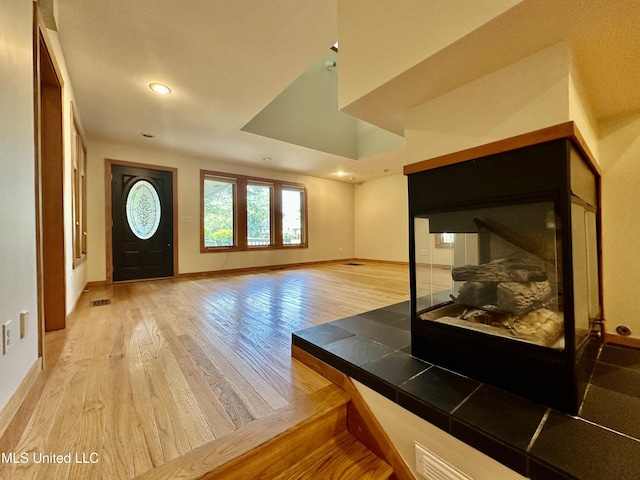211 Monterey Dr, Clinton, MS 39056 - entryway with light wood-style flooring, baseboards, and recessed lighting