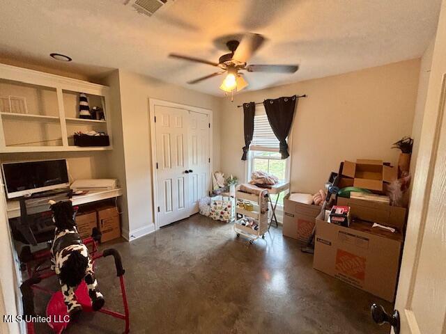 office area with ceiling fan