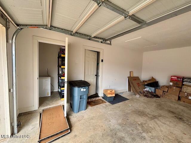 garage featuring fridge