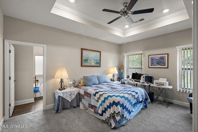 203 Vision Cv, Canton, MS 39046 - bedroom with a tray ceiling, crown molding, carpet floors, recessed lighting, and an office area