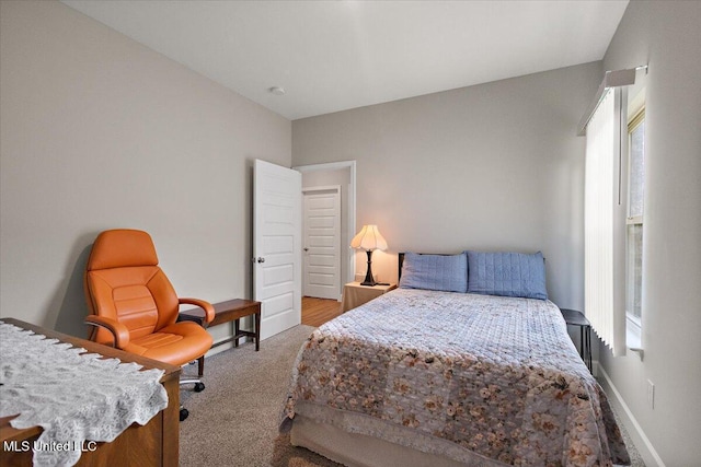 203 Vision Cv, Canton, MS 39046 - carpeted bedroom featuring baseboards