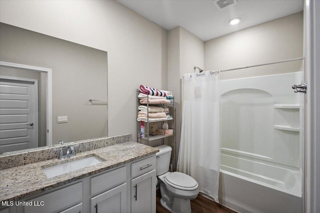 203 Vision Cv, Canton, MS 39046 - full bath featuring vanity, shower / bath combo with shower curtain, and wood finished floors
