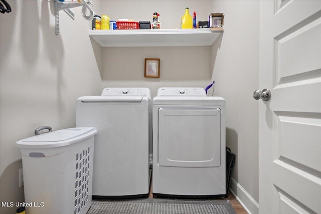 203 Vision Cv, Canton, MS 39046 - laundry area with independent washer and dryer and wood finished floors