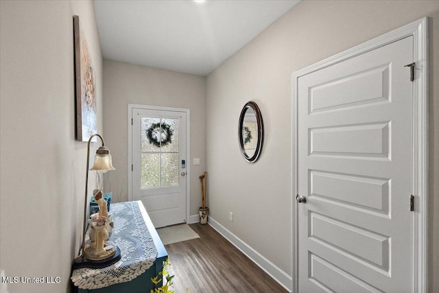 203 Vision Cv, Canton, MS 39046 - entryway with baseboards and dark wood finished floors