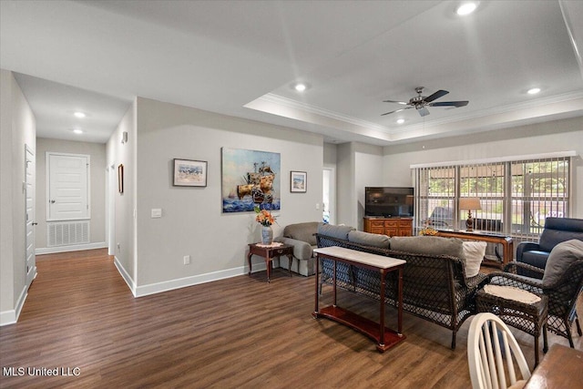 203 Vision Cv, Canton, MS 39046 - living room featuring crown molding, a tray ceiling, dark wood-type flooring, a ceiling fan, and recessed lighting