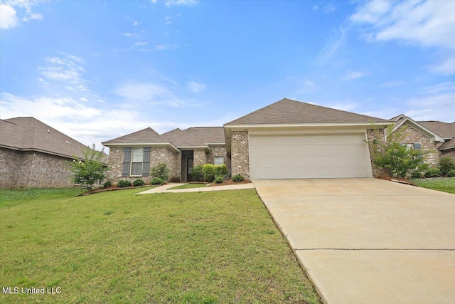 946 Filmore Dr, Brandon, MS 39042 - view of front facade featuring brick siding, a front yard, driveway, and an attached garage