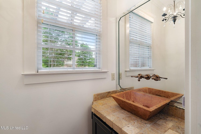 4050 Robinson Xing, Olive Branch, MS 38654 - bathroom featuring a chandelier and vanity