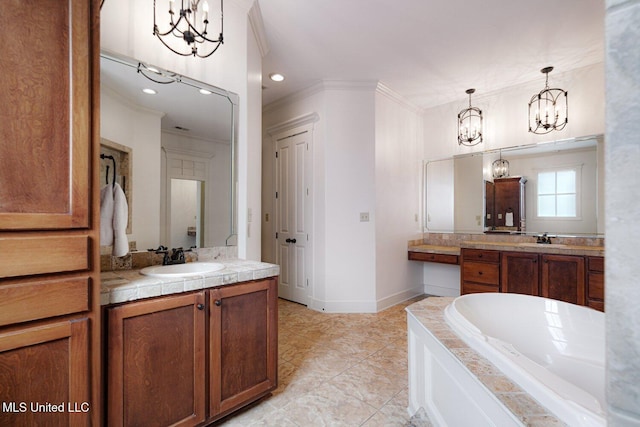 4050 Robinson Xing, Olive Branch, MS 38654 - bathroom with a chandelier, ornamental molding, a bath, two vanities, and recessed lighting