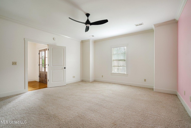 4050 Robinson Xing, Olive Branch, MS 38654 - spare room with crown molding, carpet, a ceiling fan, and baseboards