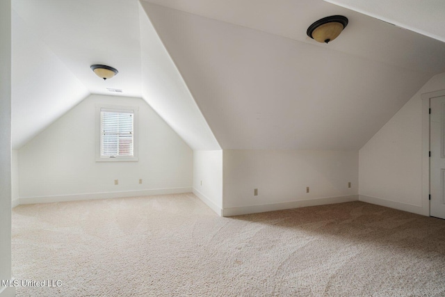 4050 Robinson Xing, Olive Branch, MS 38654 - bonus room with vaulted ceiling, baseboards, and light colored carpet